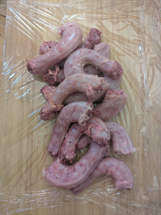 Pile of chicken necks fed a corn free soy free diet. Raised and butchered in Virgin, Utah